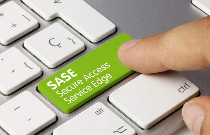 SASE Secure Access Service Edge inscription on green keyboard.